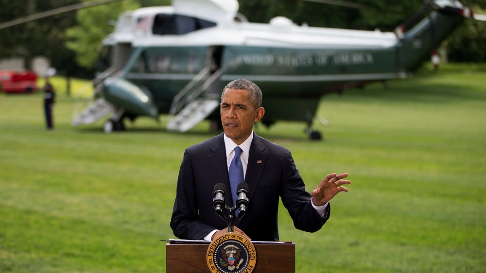 President Barack Obama talks about his administration's response to a growing insurgency foothold in Iraq, Friday, June 13, 2014, on the South Lawn of the White House in Washington, prior to boarding the Marine One Helicopter for Andrews Air Force Base, M
