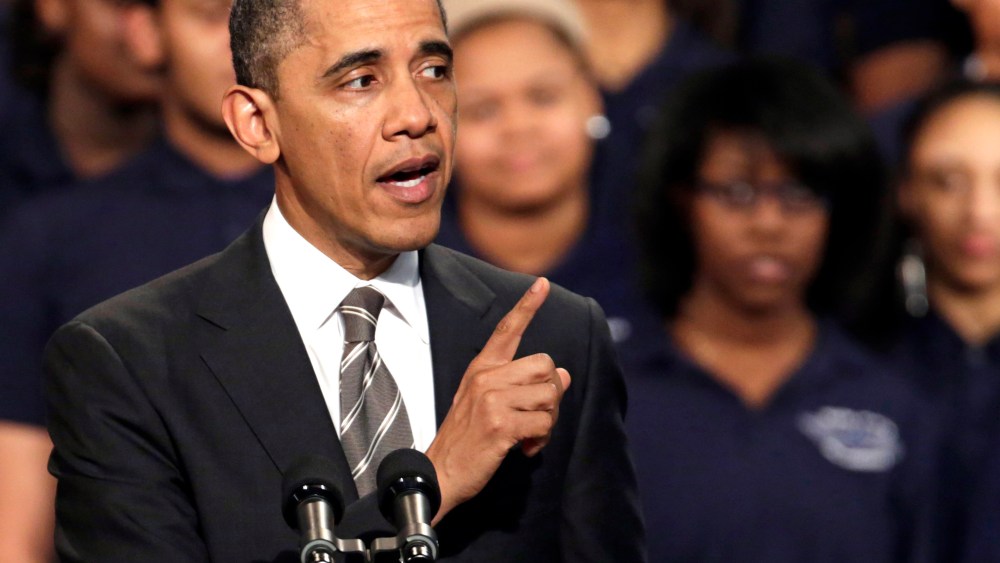President Barack Obama speaks about strengthening the economy for the middle class and the nations struggle with gun violence at an appearance at Hyde Park Academy, Friday, Feb. 15, 2013, in Chicago.  (Photo by M. Spencer Green/AP Photo)