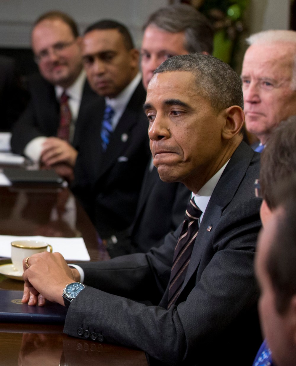 President Barack Obama pauses as he speaks to media before a meeting with mayors and newly-elected mayors from across the country, Friday, Dec. 13, 2013, in the Roosevelt Room of the White House.