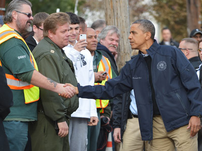 President Obama greeting workers on New York City's Staten Island on Thursday. (Ngan Mandel/AFP Photo)