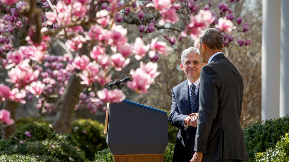 Federal appeals court judge Merrick Garland shakes hands with President Barack Obama as he is introduced as Obama's nominee for the Supreme Court during an announcement in Washington, D.C., March 16, 2016. (Photo by Andrew Harnik/AP)