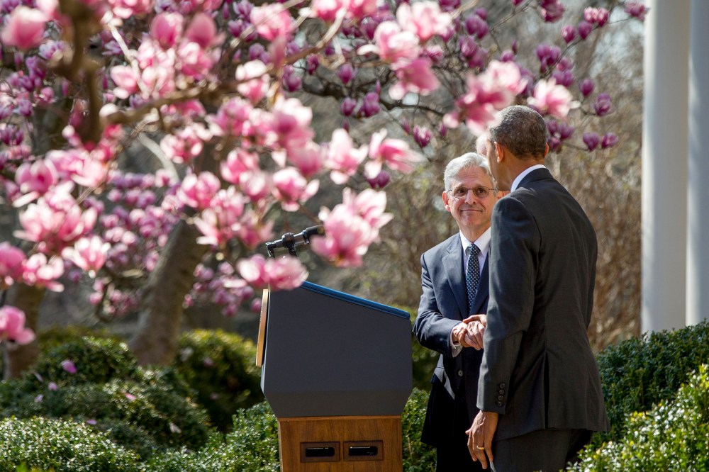 Federal appeals court judge Merrick Garland shakes hands with President Barack Obama as he is introduced as Obama's nominee for the Supreme Court during an announcement in Washington, D.C., March 16, 2016. (Photo by Andrew Harnik/AP)