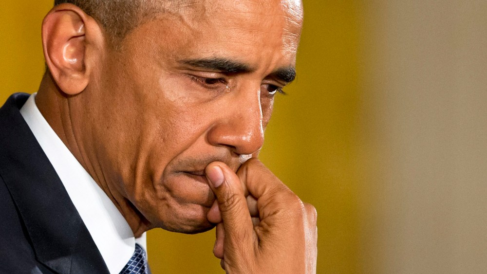 An emotional President Barack Obama pauses as he speaks about the youngest victims of the Sandy Hook shootings, Jan. 5, 2016, in the East Room of the White House in Washington, D.C. (Photo by Jacquelyn Martin/AP)