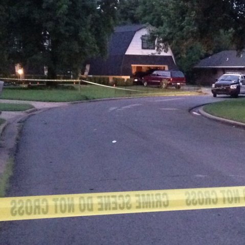 Crime scene tape marks off the area as police investigate scene, July 23, 2015, in Broken Arrow, Okla., where authorities say five people were found dead late Wednesday night. (Photo by Justin Juozapavicius/AP)
