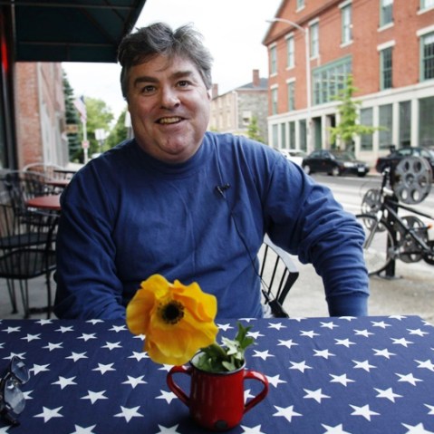 Jonathan Flynn, of Rhode Island, discusses politics with Julie Winokur, executive director of Talking Eyes Media, for her latest project, Bring it to the Table, Wednesday at Cable Car Cinema and Cafe in Providence, Rhode Island, on June 6, 2012.