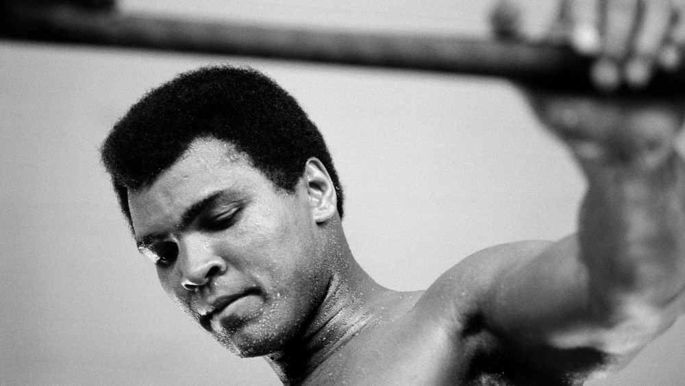 Muhammad Ali pauses during training in Kinshasa, Zaire.