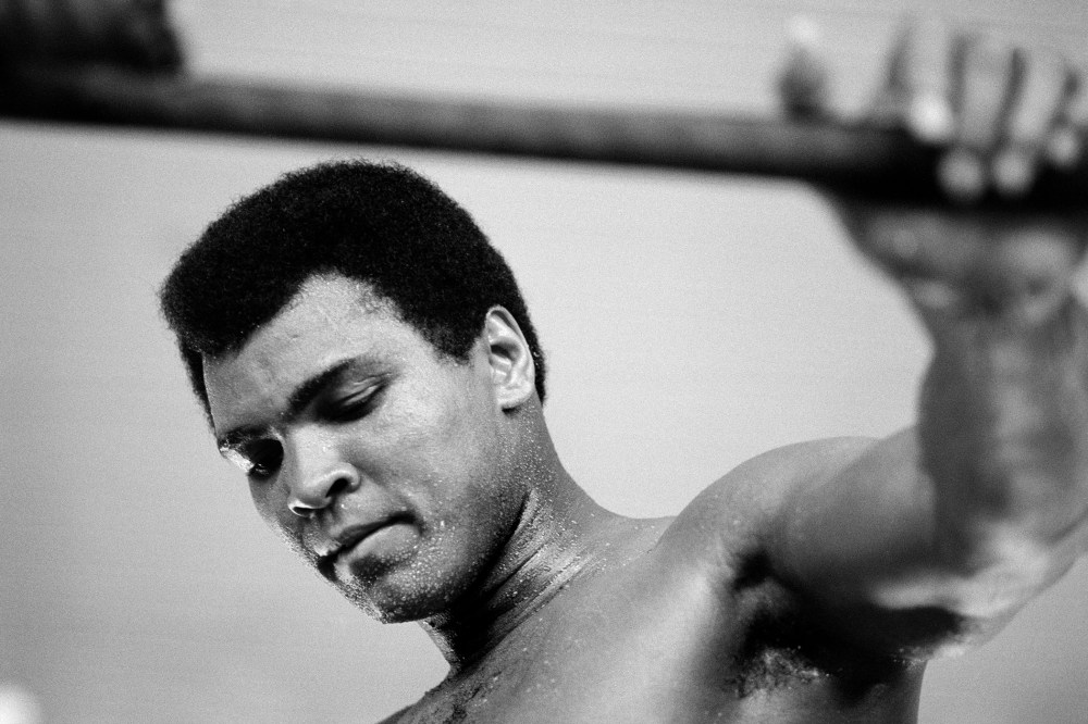 Muhammad Ali pauses during training in Kinshasa, Zaire.