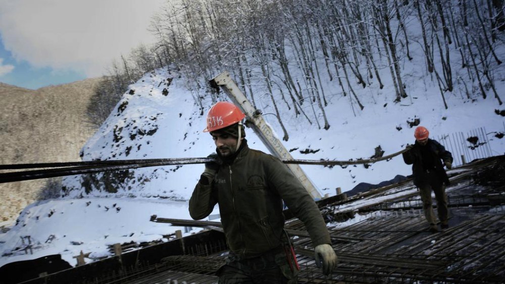 Foreign workers on a construction site for a ski resort in Krasnaya Polyana, near Sochi, Russia.