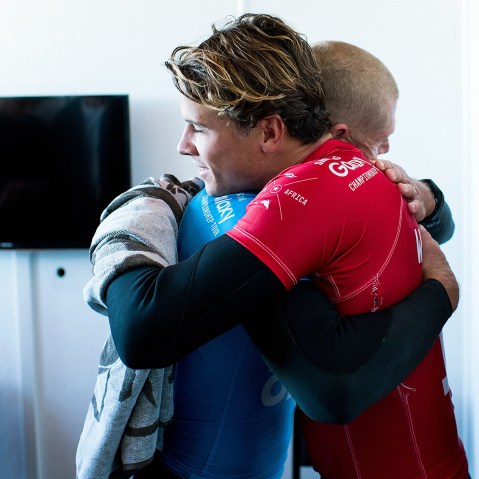 Mick Fanning and Julian Wilson (Photo by Kristen Scholtz/WSL/AFP/Getty)