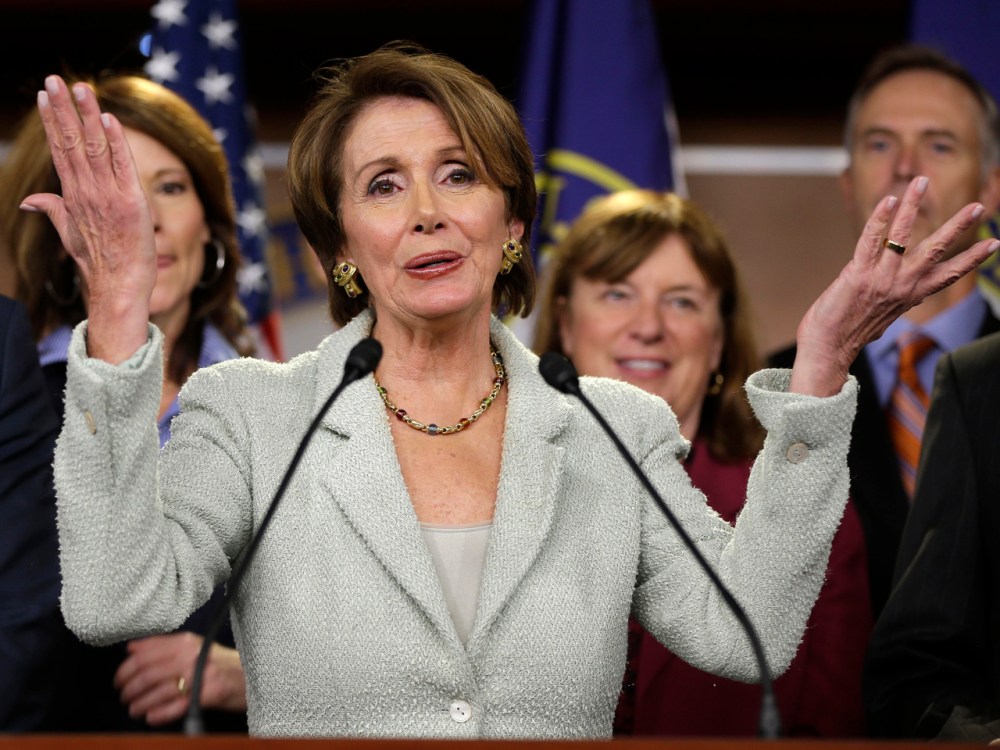 House Minority Leader Nancy Pelosi of Calif. gestures during a news conference on Capitol Hill in Washington, Tuesday, Nov. 13, 2102, with newly elected Democratic House members. (AP Photo/Pablo Martinez Monsivais)