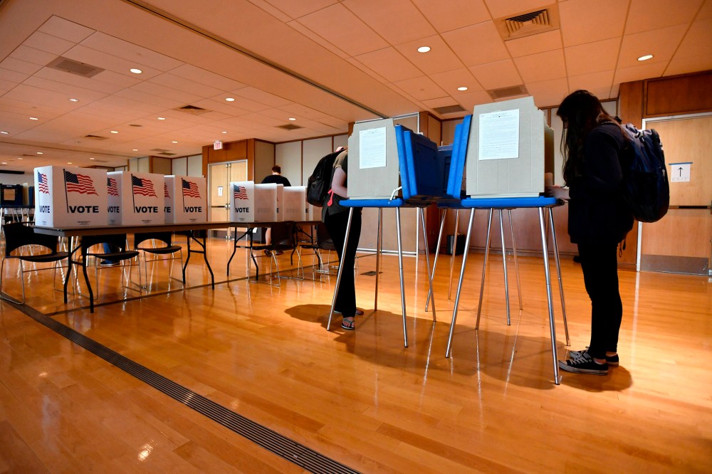 Students vote in the precinct located in the HUB-Robeson Center on the Penn State University campus in University Park, Pa. on April 26, 2016. (Photo by Nabil K. Mark/Centre Daily Times/AP)