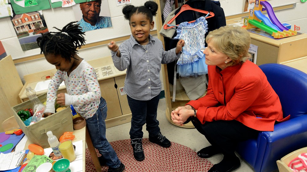 Gov. Bev Perdue, right, listens to Amaya Bryant and Jalynn Brandon, left,  Monday, Dec. 10, 2012, at Primary Colors Early Learning Center in Durham, N.C. Perdue visited the Pre-K classes to highlight the importance of preschool. (AP Photo/The Herald...