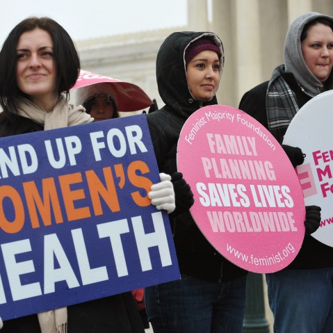 File photo: Pro-choice activists hold placards during a rally outside of the Supreme Court on January 23, 2012 in Washington, DC.  (Photo: Mandel Ngan/AFP Photo)
