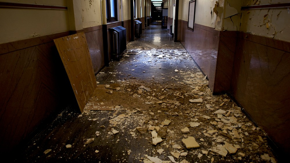Debris litters the now vacant hallways of the George W. Childs School in Philadelphia, Jan. 31, 2014.