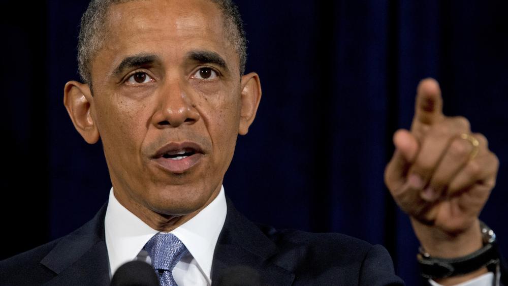 President Barack Obama gestures while speaking in San Jose, Calif. , Friday, June 7, 2013. The president defended his government's secret surveillance, saying Congress has repeatedly authorized the collection of America's phone records. (AP Photo/Evan...