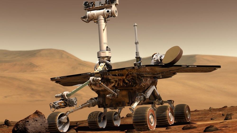An artist's concept portrays a NASA Mars Exploration Rover on the surface of Mars.