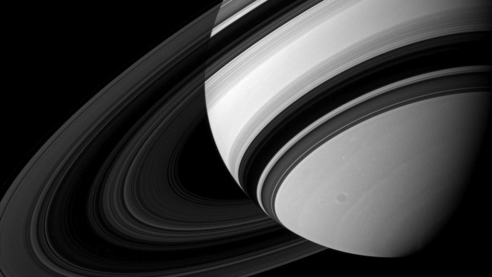 Saturn's B ring is the most opaque of the main rings, appearing almost black in this Cassini image taken from the unlit side of the ringplane.