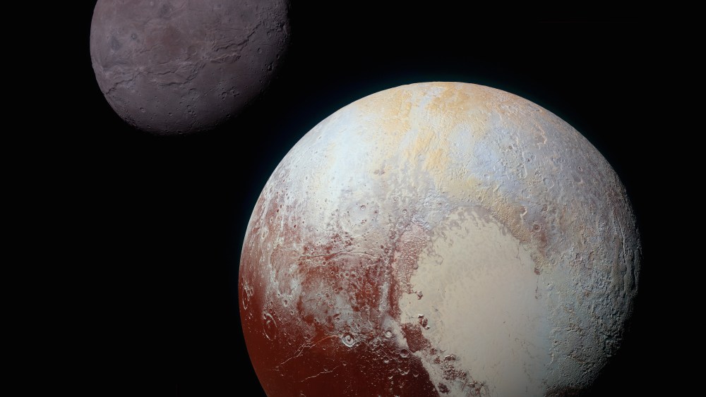 A composite of enhanced color images of Pluto (lower right) and Charon (upper left), taken by NASA's New Horizons spacecraft as it passed through the Pluto system on July 14, 2015.