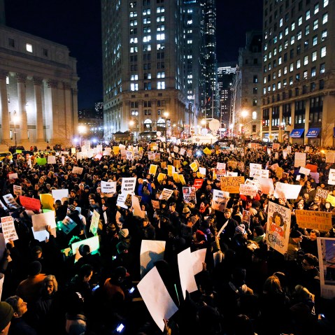 Protesters rally against a grand jury's decision not to indict the police officer involved in the death of Eric Garner in Foley Square, Dec. 4, 2014, in New York, N.Y. (Photo by Jason DeCrow/AP)