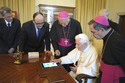Pope Benedict XVI uses an iPad device at the Vatican in this file photo dated June 28, 2011. Pope Benedict's handle on Twitter will be @pontifex. He already has 1.2 billion "followers" in the standard sense of the word but next week he will have...