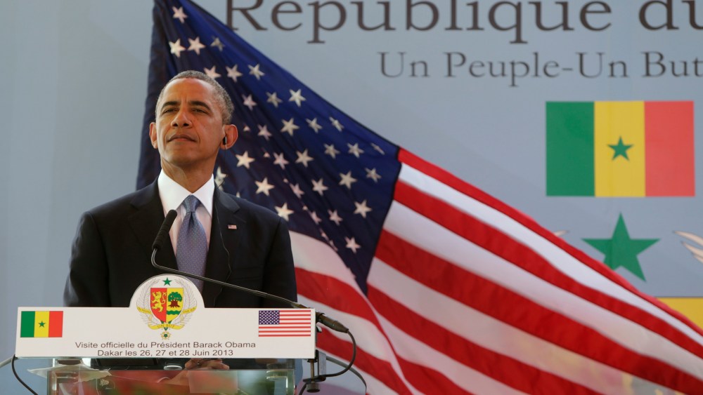 U.S. President Barack Obama listens to a question during a joint news conference with Senegal's President Macky Sall (not pictured) at the Presidential Palace in Dakar June 27, 2013. (Photo by Gary Cameron/Reuters)
