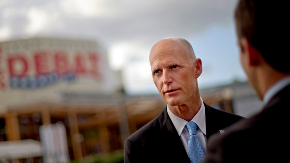 File Photo: Florida Gov. Rick Scott, (Photo by David Goldman/AP)