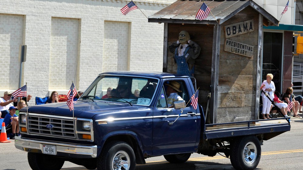 A float with the words "Obama Presidential Library" is seen during the Fourth of July parade in downtown Norfolk, Neb. July 4, 2014.