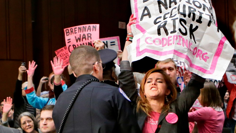 Protesters from CODEPINK, a social justice group opposed to U.S. funded wars, disrupt the start of a Senate Intelligence Committee's confirmation hearing for John Brennan, the top White House adviser on counterterrorism and nominee to lead the Central...