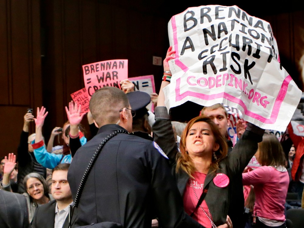 Protesters from CODEPINK, a social justice group opposed to U.S. funded wars, disrupt the start of a Senate Intelligence Committee's confirmation hearing for John Brennan, the top White House adviser on counterterrorism and nominee to lead the Central...