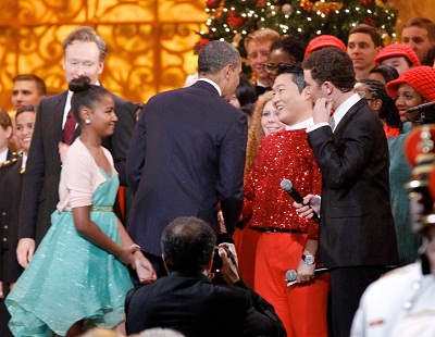 President Obama shakes hands with PSYat the 'Christmas in Washington' concert at in Washington, D.C, on December 09 2012 (Photo by Rex Features via AP Images)
