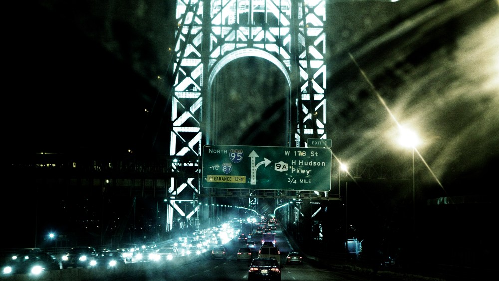 A night scene of the George Washington Bridge.