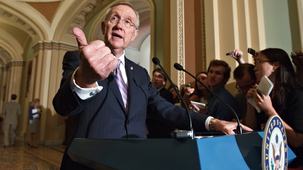 Senate Majority Leader Harry Reid of Nev. speaks to reporters on Capitol Hill in Washington, Tuesday, June 26, 2012, following the Democrats' weekly strategy session.  (AP Photo/J. Scott Applewhite)