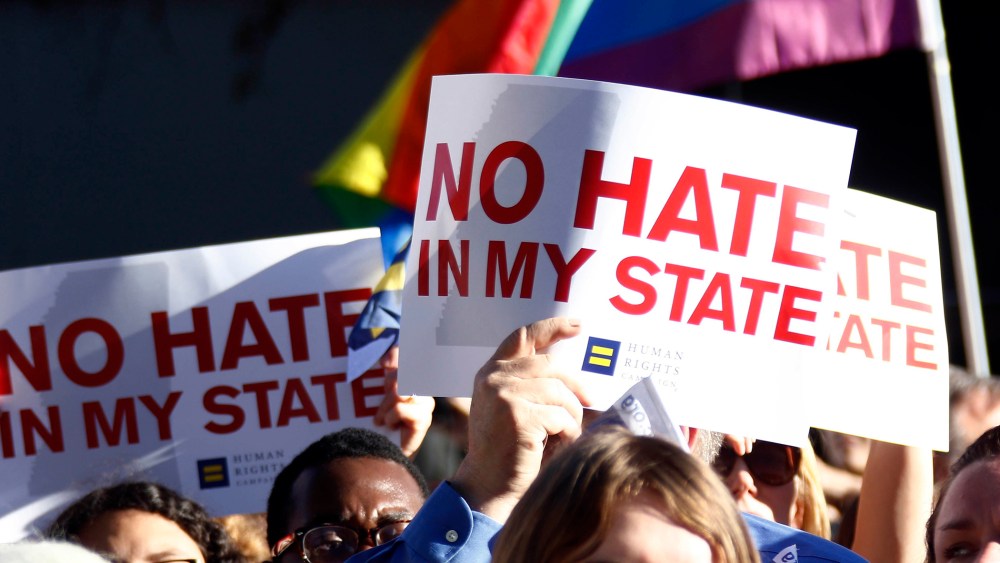 Protesters call for Mississippi Gov. Phil Bryant to veto House Bill 1523, which they says will allow discrimination against LGBT people, during a rally outside the Governor's Mansion in Jackson, Miss., April 4, 2016. (Photo by Rogelio V. Solis/AP)