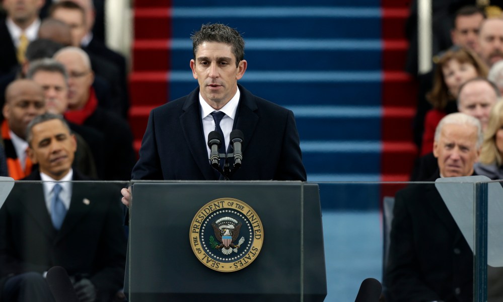 President Barack Obama, left, and Vice President Joe Biden listen as poet Richard Blanco speaks at the ceremonial swearing-in on the West Front of the U.S. Capitol during the 57th Presidential Inauguration in Washington, Monday, Jan. 21, 2013. (AP...