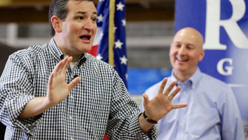 Sen. Ted Cruz, R-Texas, left, campaigns in Omaha, Neb., Friday, May 9, 2014, on behalf of Nebraska Republican gubernatorial candidate Pete Ricketts, right.