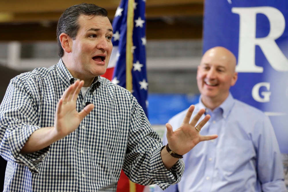 Sen. Ted Cruz, R-Texas, left, campaigns in Omaha, Neb., Friday, May 9, 2014, on behalf of Nebraska Republican gubernatorial candidate Pete Ricketts, right.