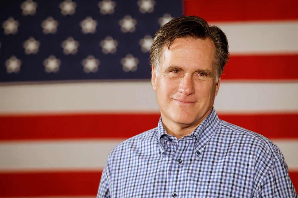 FILE - In this Dec. 30, 2011, file photo Republican presidential candidate, former Massachusetts Gov. Mitt Romney, listens to a speaker at VFW Post 8641 in Merrimack, N.H. Just how rich is Mitt? Add up the wealth of the last eight presidents, from...