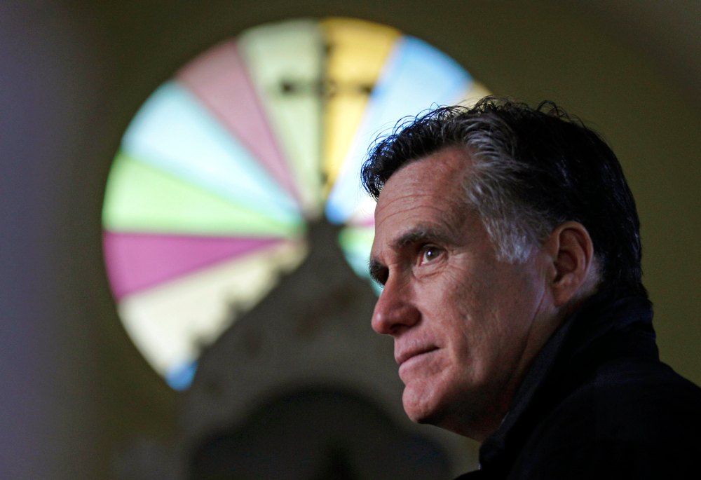 Thursday Dec. 22, 2011 Mitt Romney, visits St. Paul's Lutheran Church in Berlin, N.H. (AP Photo/Charles Krupa)