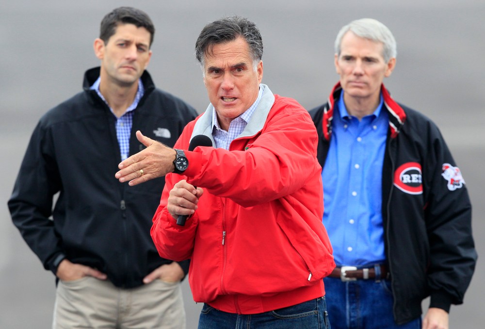 Republican presidential candidate Mitt Romney speaks during a campaign rally with his running mate Rep. Paul Ryan and campaign surrogate Sen. Rob Portman. (Photo: AP/Al Behrman)