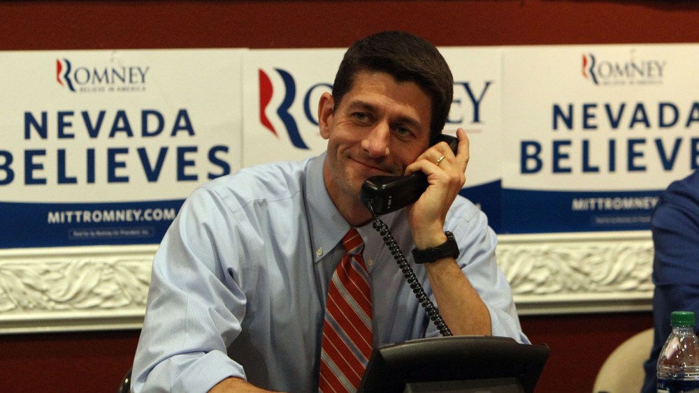 Republican vice presidential candidate, Rep. Paul Ryan of Wisconsin mans the phones at the Team Nevada headquarters in Las Vegas, Thursday, Nov. 1, 2012. (AP Photo/Las Vegas Review-Journal, Jerry Henkel, pool)