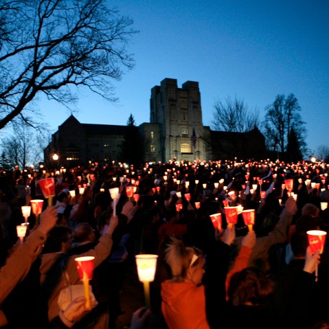 Students take part in a candlelight vigil a day after the killings at Virginia Tech in Blacksburg, Va., April 17, 2007. (Photo by Kevin Lamarque/Reuters)