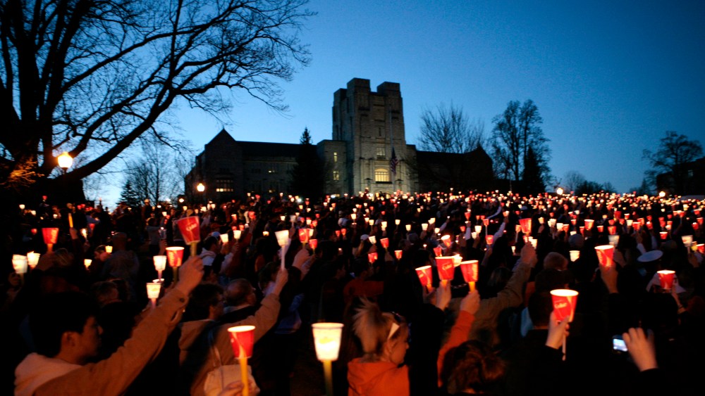 Students take part in a candlelight vigil a day after the killings at Virginia Tech in Blacksburg, Va., April 17, 2007. (Photo by Kevin Lamarque/Reuters)