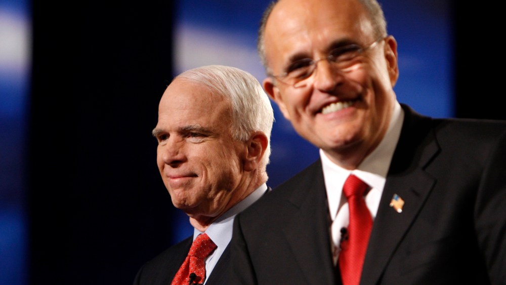Former US Republican presidential candidates John McCain and Rudy Giuliani smile before the MSNBC Republican presidential debate in Boca Raton, Florida, January 24, 2008. (Photo by Carlos Barria/Reuters)