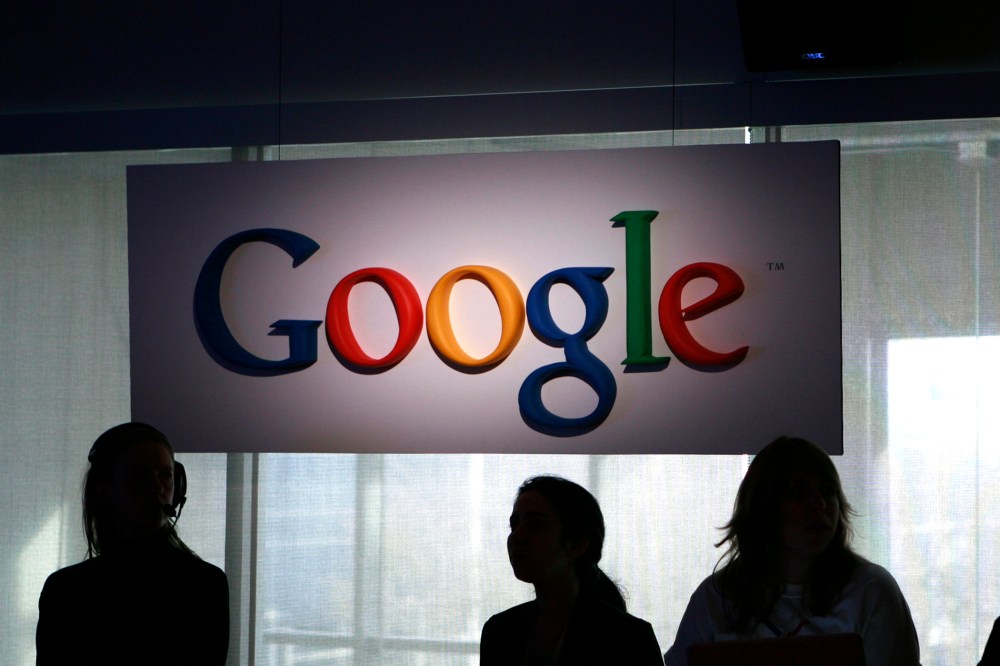 Attendees stand during a news conference at Google headquarters in Mountain View, California. (Photo by Robert Galbraith/Reuters)