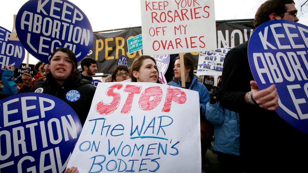Pro-choice activists demonstrate during March for Life Fund's 37th annual march in Washington