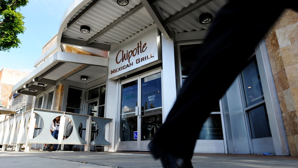 A pedestrian walks past a Chipotle Mexican Grill in Beverly Hills