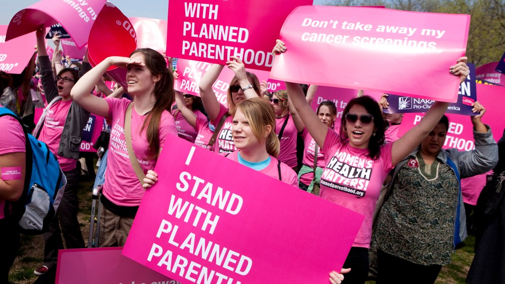 Planned Parenthood supporters rally in supporting preventive health care and family planning services in Washington on April 7, 2011. (Photo by Joshua Roberts/Reuters)