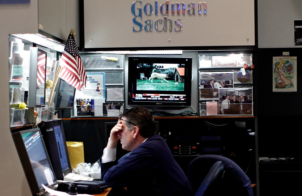 A trader works in the Goldman Sachs booth on the main trading floor of the New York Stock Exchange