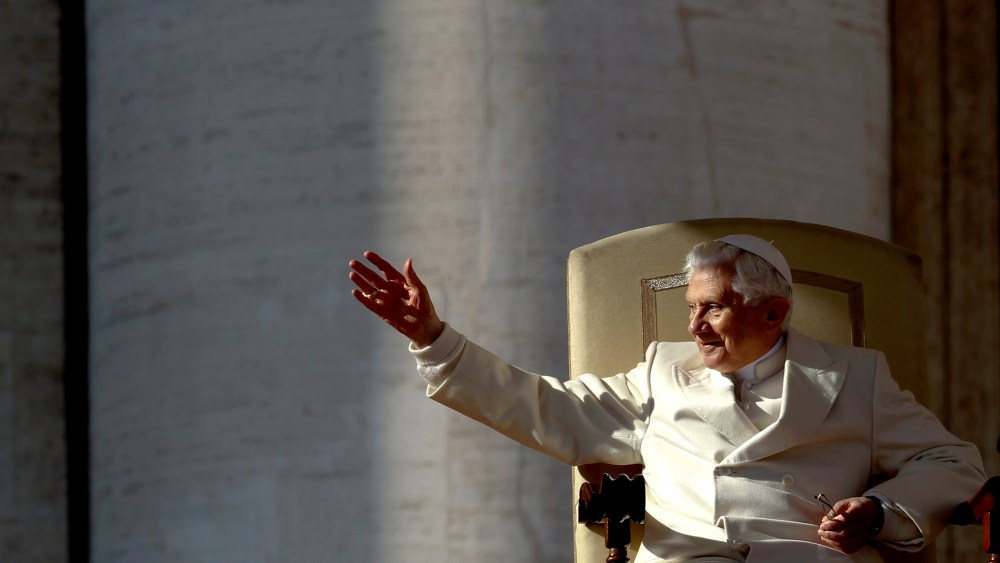 Pope Benedict XVI waves as he leads his weekly audience in Saint Peter's Square at the Vatican Nov. 16, 2011.