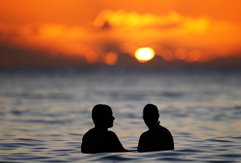 Sunset from the waters off Waikiki Beach in Honolulu, Hawaii. (File photo by Jason Reed/Reuters)